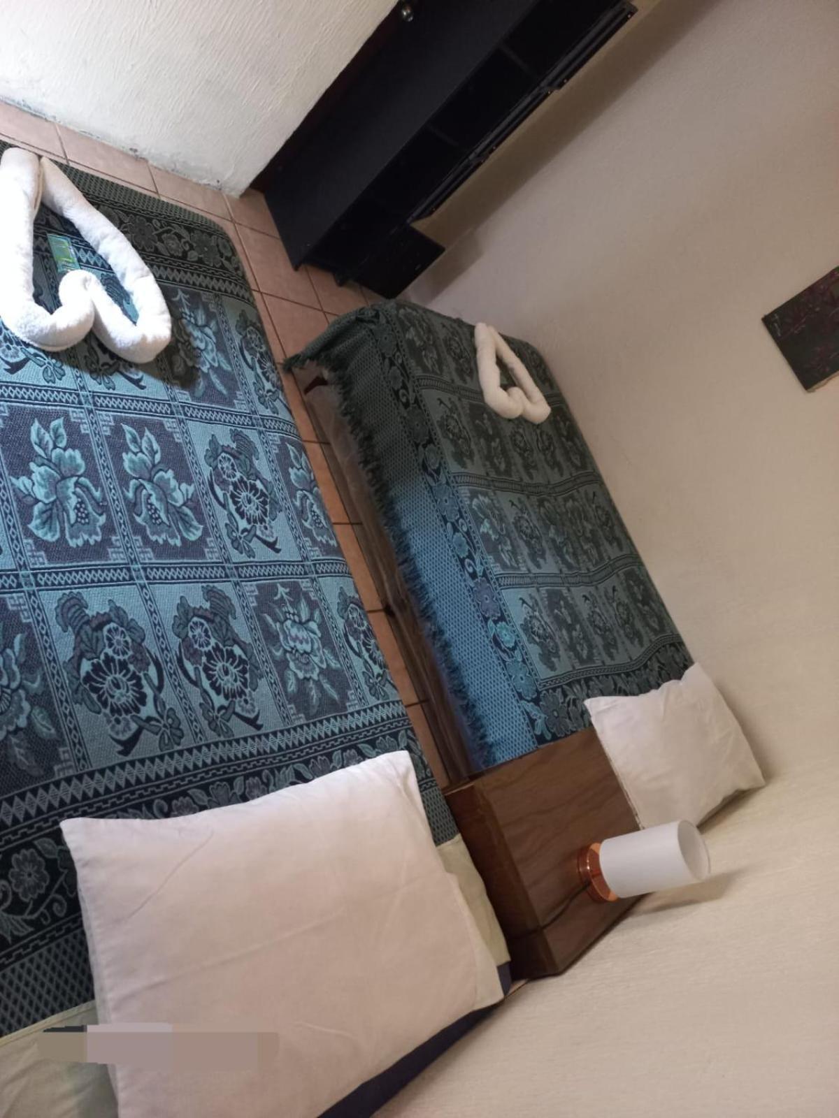 Huellas Hostal Antigua Habitación foto