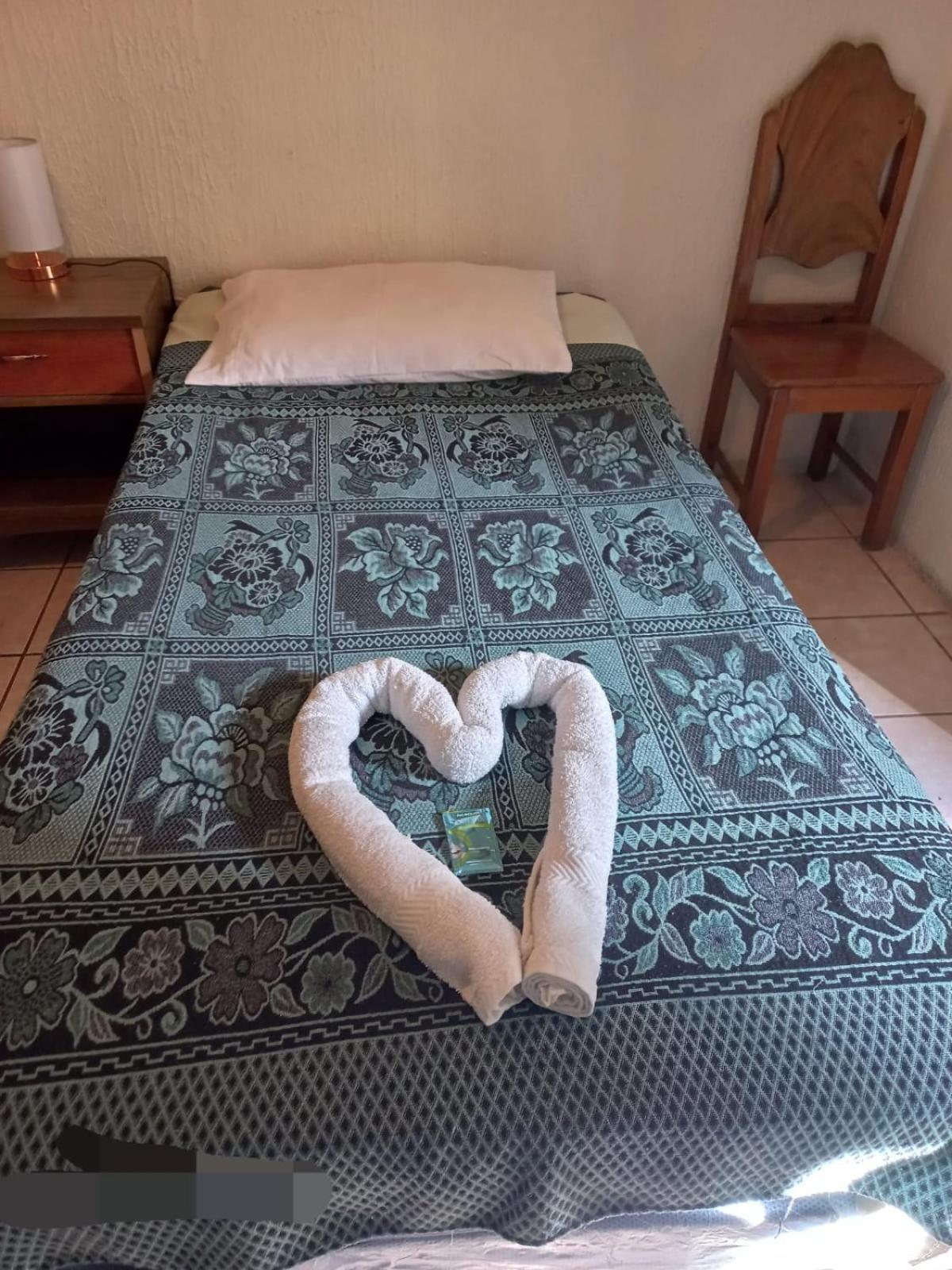 Huellas Hostal Antigua Habitación foto